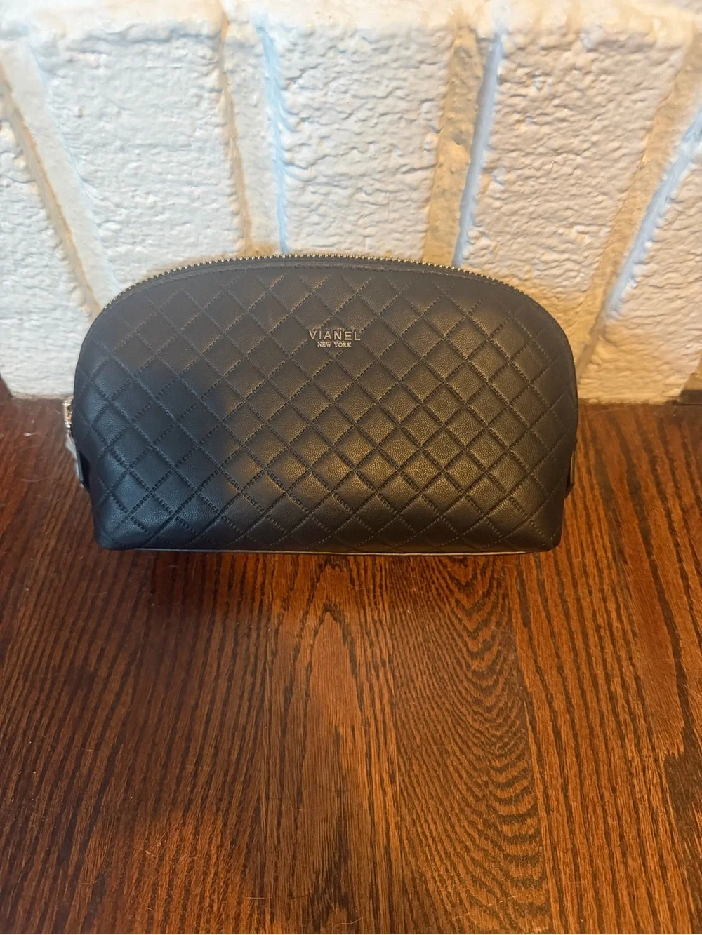 NWT! VIANEL NEW YORK Dome Dopp Kit with gold logo on the front.